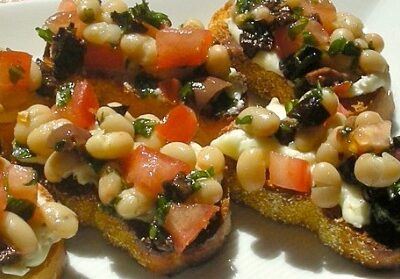 White Bean Tomato Goat Cheese and Olive Bruschetta