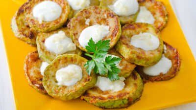 zucchini latkes with yogurt curry sauce