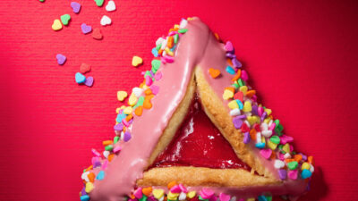 Ruby chocolate dipped, candy heart covered hamantaschen