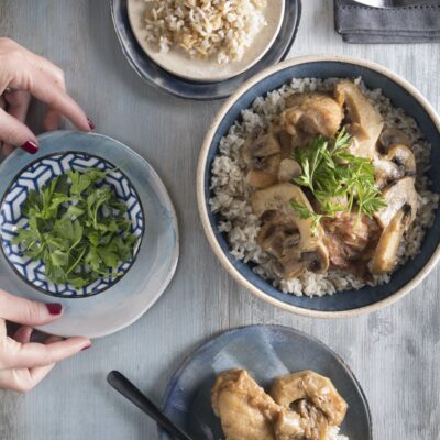Chicken in wine sauce with mushrooms and artichokes