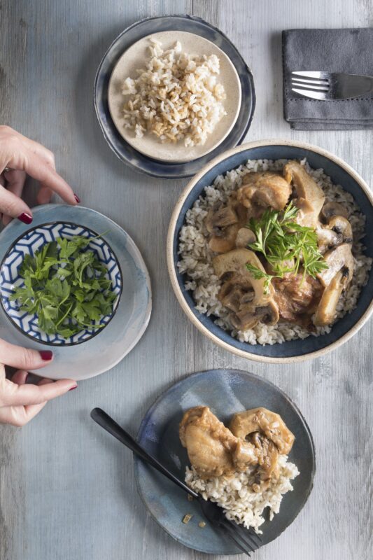 Chicken in wine sauce with mushrooms and artichokes
