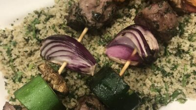 Kabobs with green couscous