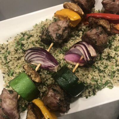 Kabobs with green couscous