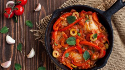 white fish with peppers and onions